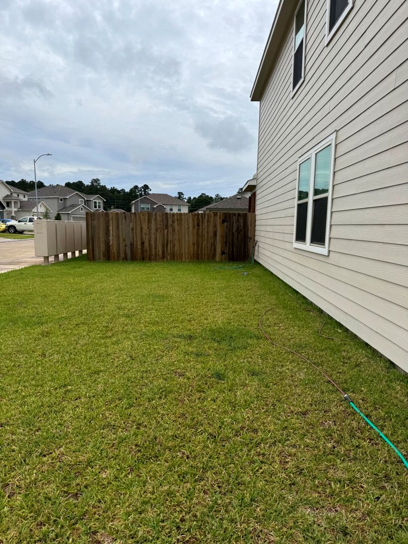 Backyard before cedar fence extension